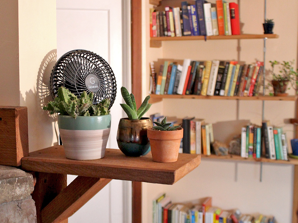A fan on a shelf